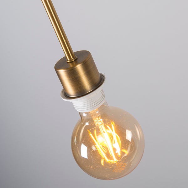 LED-Filament-Leuchtmittel in Globe-Form mit einer Fassung aus Metall in Messing-Optik.