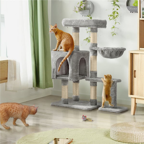 Katzenkratzbaum mit Liegeflächen, Höhle und Kratzstämmen im Wohnzimmer