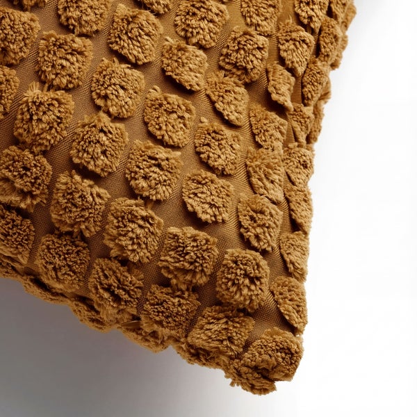 Dekokissen mit Noppenstruktur