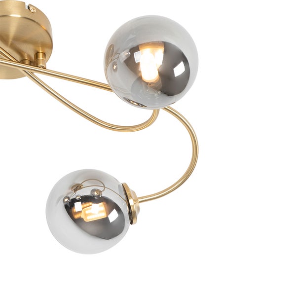 Deckenleuchte mit runden, grau getönten Glasschirmen und goldfarbenem Metallgestell