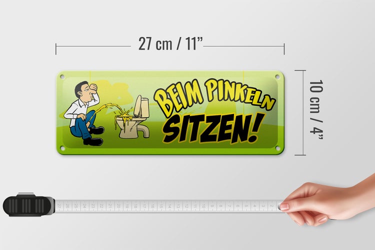 Blechschild Spruch 27x10cm Beim Pinkeln sitzen Dekoration