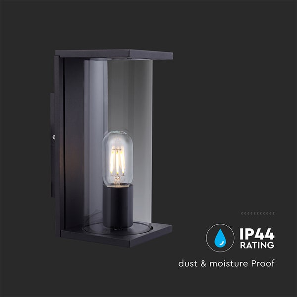 Schwarze Wandaußenleuchte mit zylindrischem Glasschirm und LED Leuchtmittel, IP44 Schutz gegen Staub und Feuchtigkeit.
