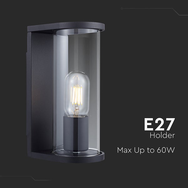 Anthrazitfarbene Außenwandleuchte mit zylindrischem Glasschirm und E27-Fassung für maximal 60 Watt.