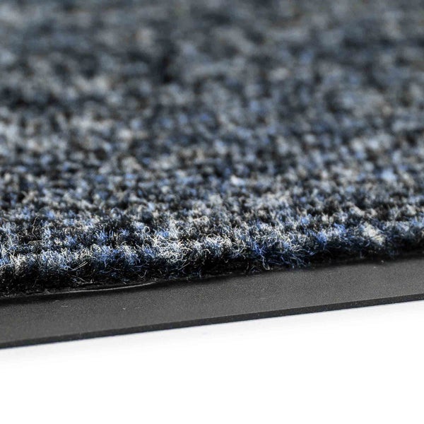 Detailaufnahme einer Schmutzfangmatte mit textiler Oberfläche und rutschfester Rückseite