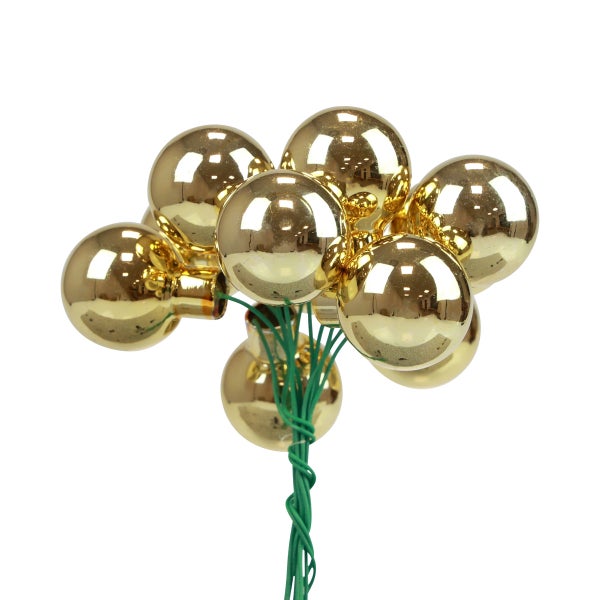 Strauß goldfarbener Christbaumkugeln auf Draht