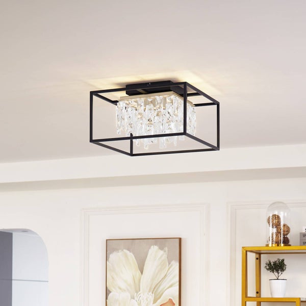 Moderne quadratische Deckenleuchte mit schwarzem Metallrahmen und hängenden Glaskristallen in einem hellen Raum.