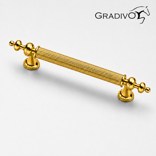 Möbelgriff Gradivo, klassisch, goldfarben, geriffelt, mit verzierten Enden.