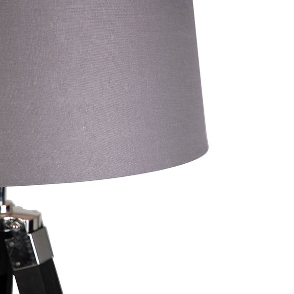 Detailansicht einer Stehlampe mit grauem Lampenschirm