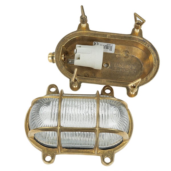 Ovale Messingleuchte mit Schutzgitter und offenem Gehäuse