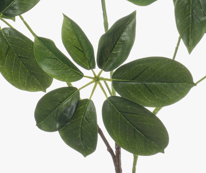 Künstlicher Schefflera-Zweig mit grünen, ovalen Blättern in fächerförmiger Anordnung.