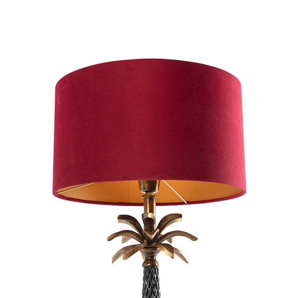 Tischleuchte mit Textilschirm und dekorativem Palmenfuß