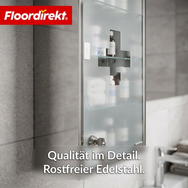 FloorDirekt Logo. Abschließbarer Arzneischrank aus rostfreiem Edelstahl mit satinierter Glastür und Kreuz-Ausschnitt.