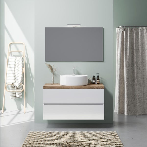Moderner Badezimmer-Waschtischunterschrank mit zwei weißen Schubladen, Holzplatte, rundem Aufsatzwaschbecken und beleuchtetem Spiegel.