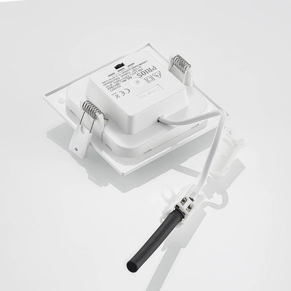 Rückansicht eines quadratischen LED-Einbaustrahlers mit Anschlusskabel, Treiber und Befestigungsfedern.