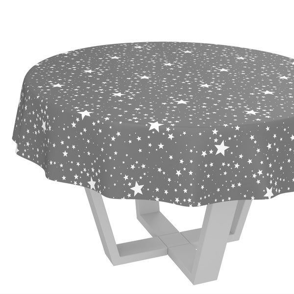 Graue runde Tischdecke mit weißen Sternen.