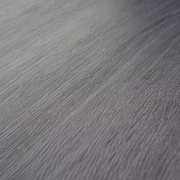 Nahaufnahme einer grauen Bodenoberfläche mit Holzstruktur
