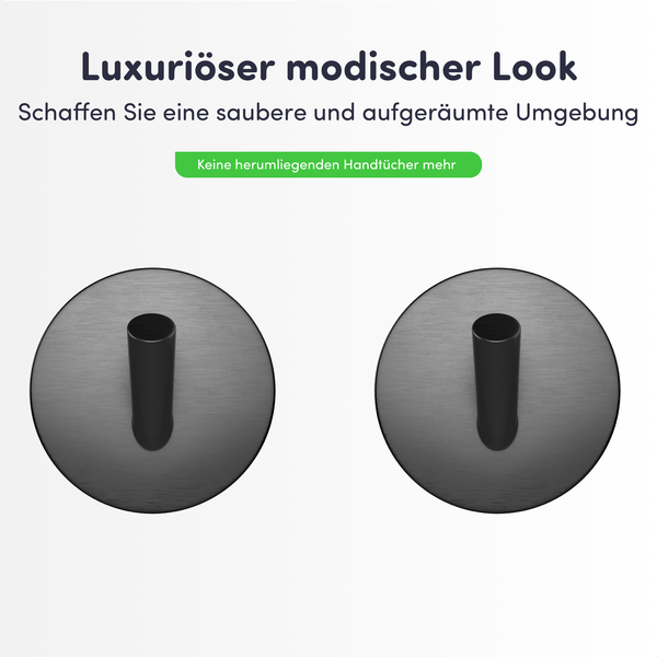 Zwei runde Handtuchhaken aus Metall in Mattschwarz.