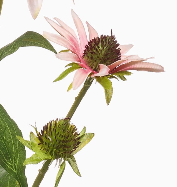 Weiße künstliche Schmucklilien mit grünen Stielen.