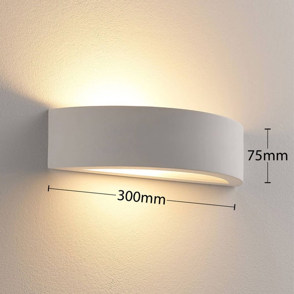 Bogenförmige Wandleuchte mit Lichtaustritt nach oben und unten, Breite 300 Millimeter und Höhe 75 Millimeter.