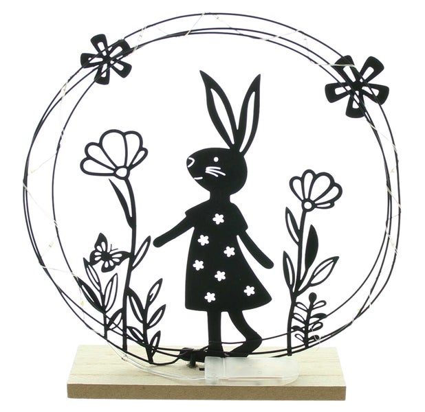 Dekorative Osterdekoration mit Hasenmotiv und LED-Beleuchtung auf Holzsockel