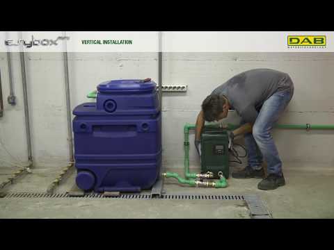 Szene mit einer Doppelhebeanlage im Kellerraum bei der Installation.