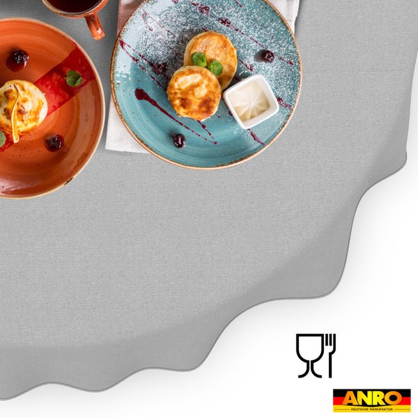 Runde Tischdecke mit Wellenrand, Textilstruktur, lebensmittelecht, ANRO Logo.