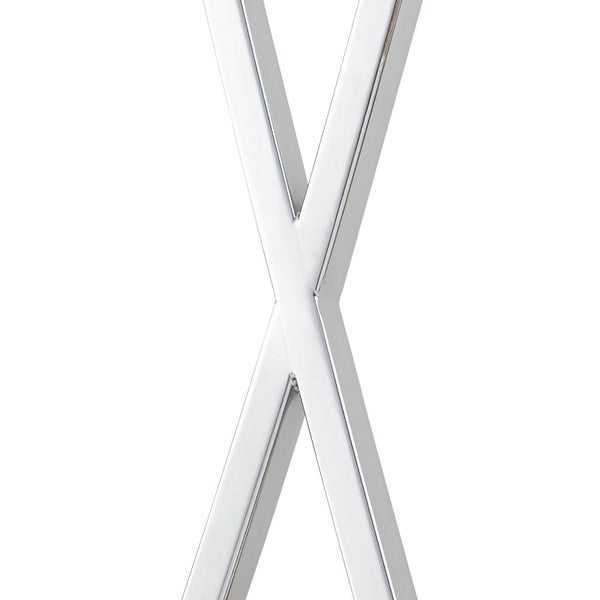 Detailansicht eines Tischbeins in X-Form aus Metall