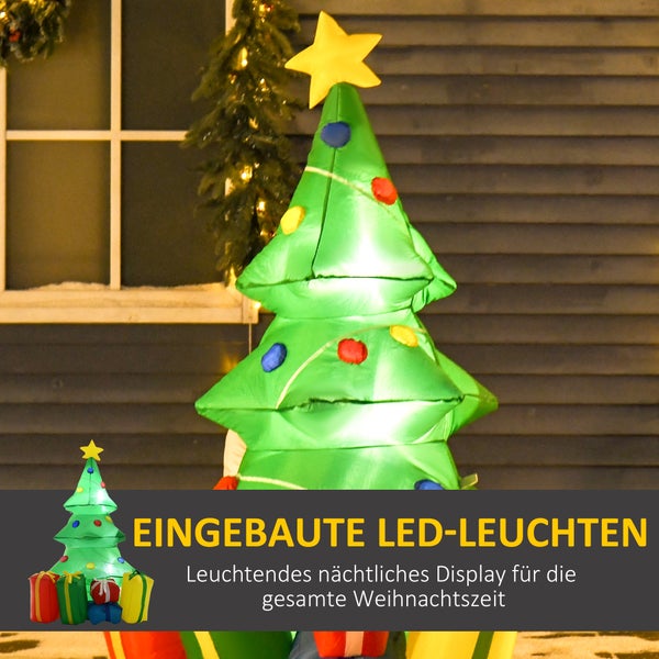 Aufblasbarer Weihnachtsbaum mit integrierter LED-Beleuchtung, bunten Ornamenten und einem Stern an der Spitze vor einer Hauswand.