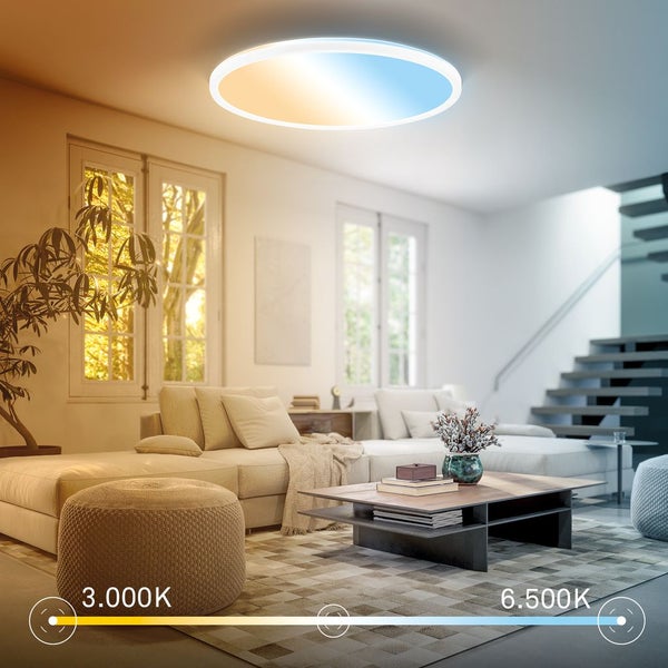 Runde LED Deckenleuchte mit einstellbarer Lichtfarbe von 3000 Kelvin warmweiß bis 6500 Kelvin tageslichtweiß im modernen Wohnzimmer.