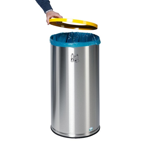 Runder Mülleimer aus Edelstahl mit gelbem Deckelring und blauem Müllsack für Plastikabfall.