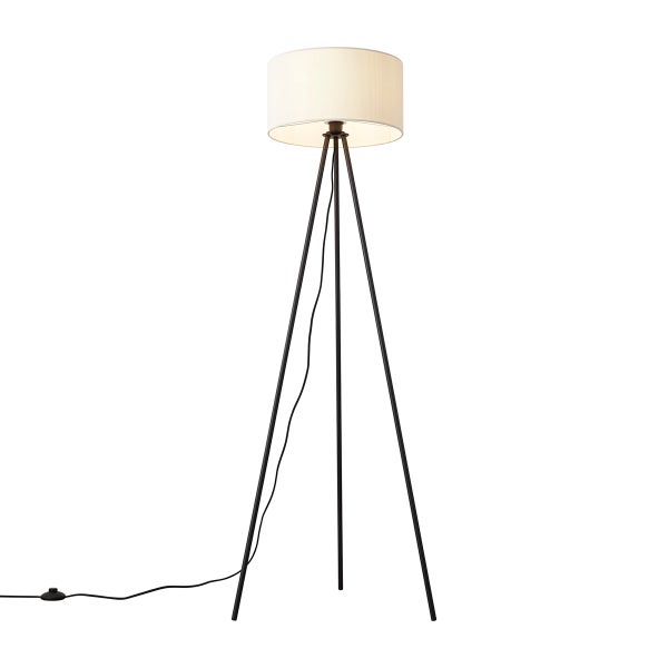 Dreibein-Stehleuchte mit schwarzem Metallgestell und cremefarbenem Stoffschirm, inklusive Kabel und Fußschalter.
