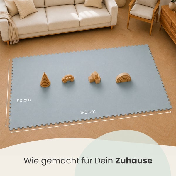 Rechteckige Schaumstoff Puzzlematte für Kinder mit Holzspielzeug auf einem Wohnzimmerboden Maße 180 mal 90 Zentimeter