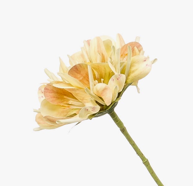 Künstliche Blume in Gelb- und Pfirsichtönen mit grünem Stiel zur Dekoration.