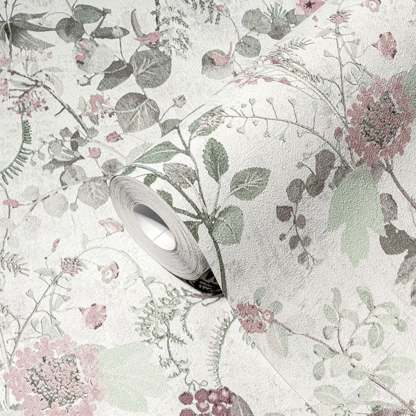 Schwarze Küchenspüle mit schwarzem Wasserhahn auf einer hellen Arbeitsplatte