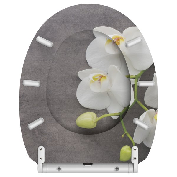 Toilettensitz mit Orchideenmotiv auf steingrauem Hintergrund mit Befestigungsscharnieren