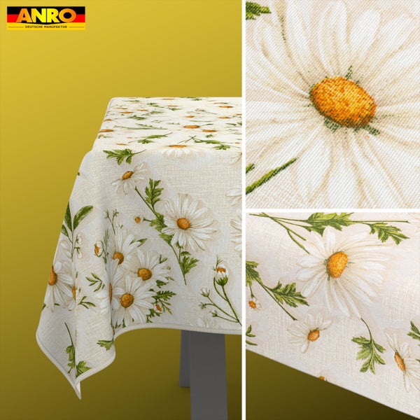 Tischdecke mit Gänseblümchen-Muster und Anro Logo. Detailansicht der Textur und des floralen Designs.