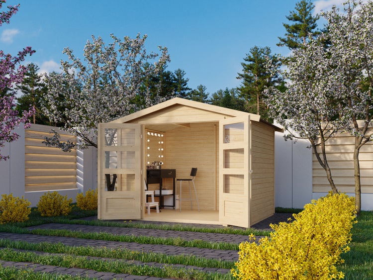 Gartenhaus aus Holz mit Satteldach und verglaster Doppeltür, eingerichtet als helles Atelier in einem gepflegten Garten mit blühenden Bäumen.
