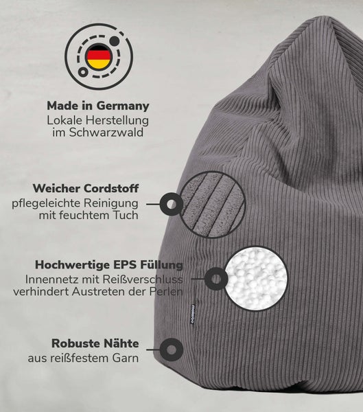 Gemütliches Duo: Cord Pouf und passender Hocker im Wohnzimmer.