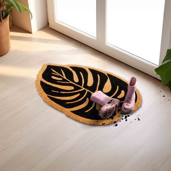 Fußmatte aus Kokosfaser mit Blattmuster und Gummistiefeln