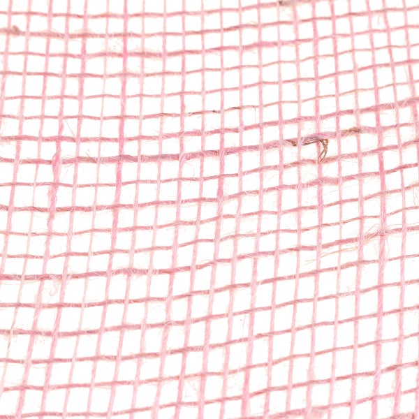 Grobmaschiges Jutegewebe in Rosa für Dekorationen und Bastelarbeiten.