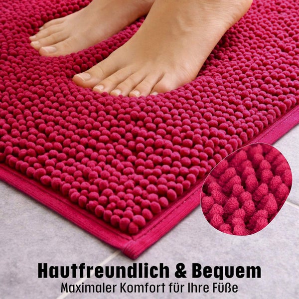 Roter Badteppich mit Fußabdruck