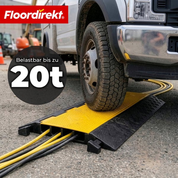 Floordirekt Logo. Eine Kabelbrücke mit mehreren Kanälen für Kabel und einer Tragfähigkeit von bis zu 20 Tonnen, über die ein Lastwagenrad fährt.