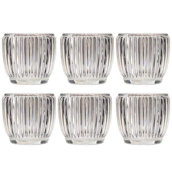 Sechser-Set Teelichthalter aus Glas mit vertikaler Rippenstruktur.