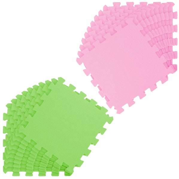 Zwei Stapel ineinandergreifende Puzzlematten aus Schaumstoff in Rosa und Grün.