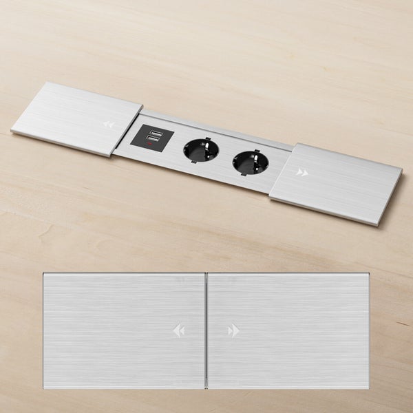Einbau Steckdosenleiste mit zwei Schutzkontaktsteckdosen und zwei USB Anschlüssen in einer Tischplatte, mit verschiebbarer Abdeckung.