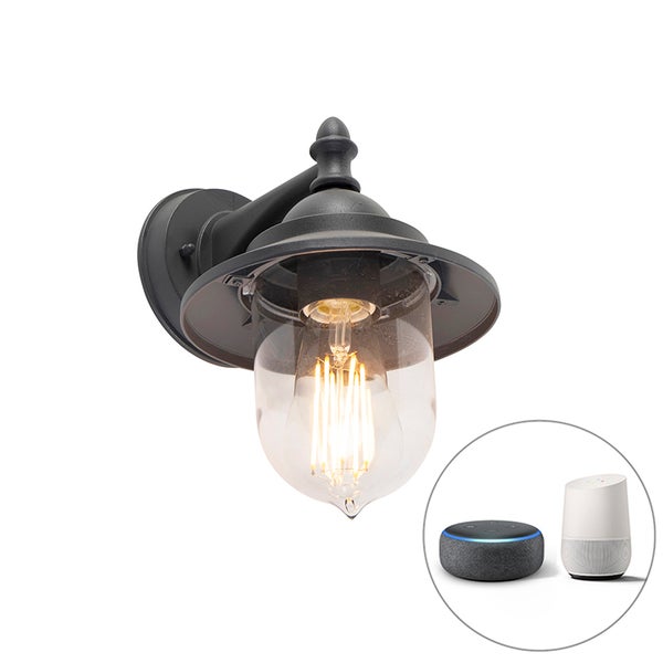 Klassische Außenwandleuchte in Schwarz mit klarem Glas und Smart-Home-Kompatibilität.
