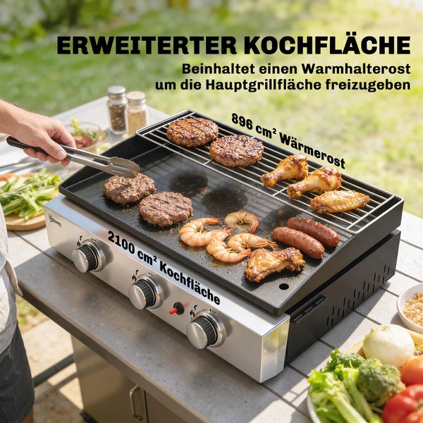 Tischgasgrill mit 2100 Quadratzentimeter Kochfläche und 896 Quadratzentimeter Warmhalterost, Edelstahlfront mit drei Drehreglern.