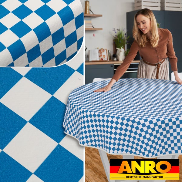 Tischdecke mit blau-weissem Rautenmuster auf einem runden Tisch mit ANRO Logo