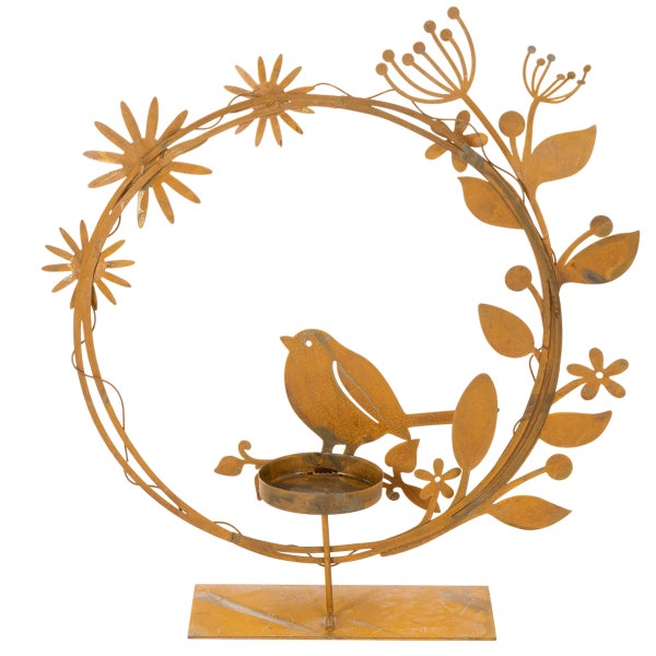 Teelichthalter aus Metall in Edelrost-Optik, kreisförmiger Rahmen mit Vogel, Blumen und Blättern auf Standfuß.
