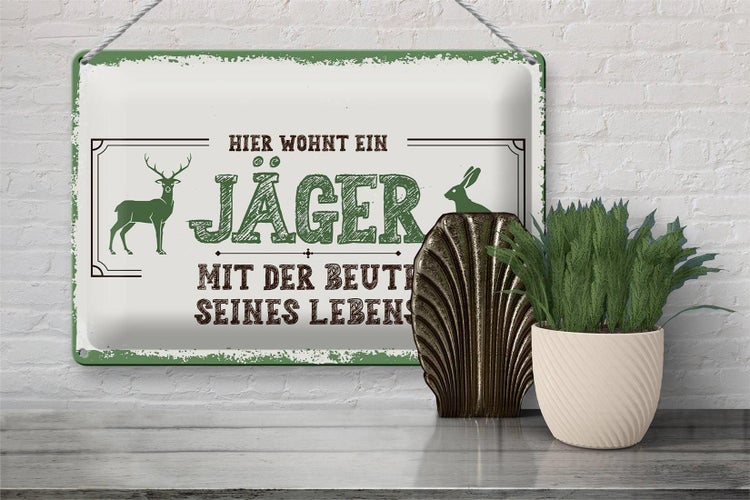 Blechschild Spruch 30x20cm Hier wohnt ein Jäger mit der Beute